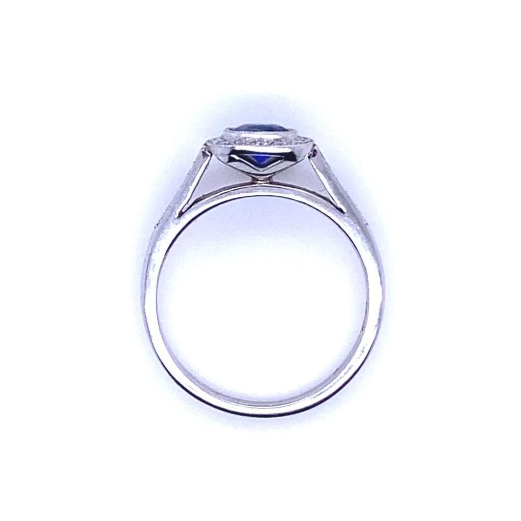 Women's 0.68 Carat Sapphire and Diamond Cluster Platinum Engagement Ring For Sale