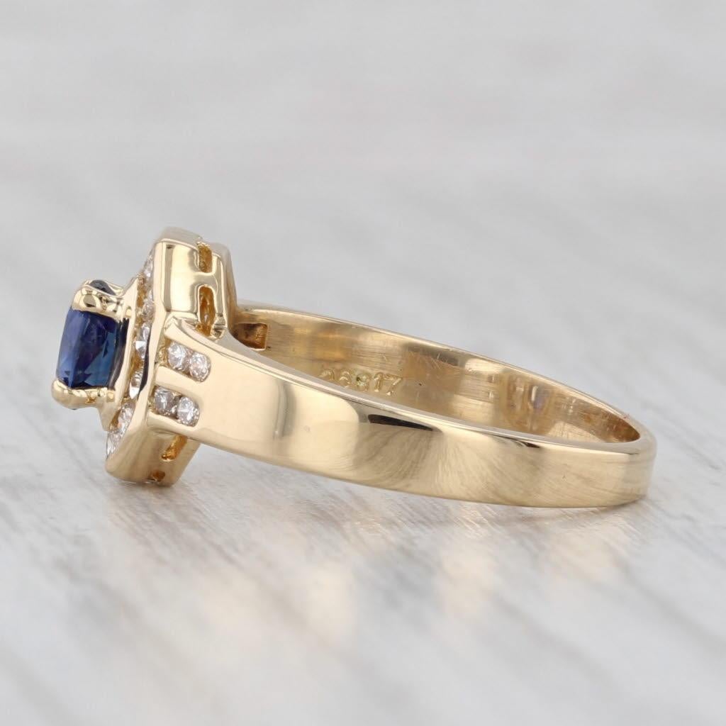 da uomo o donna Anello aureolato con diamante e zaffiro blu da 0,68 carati in oro giallo 18 carati, misura 6,5. in vendita