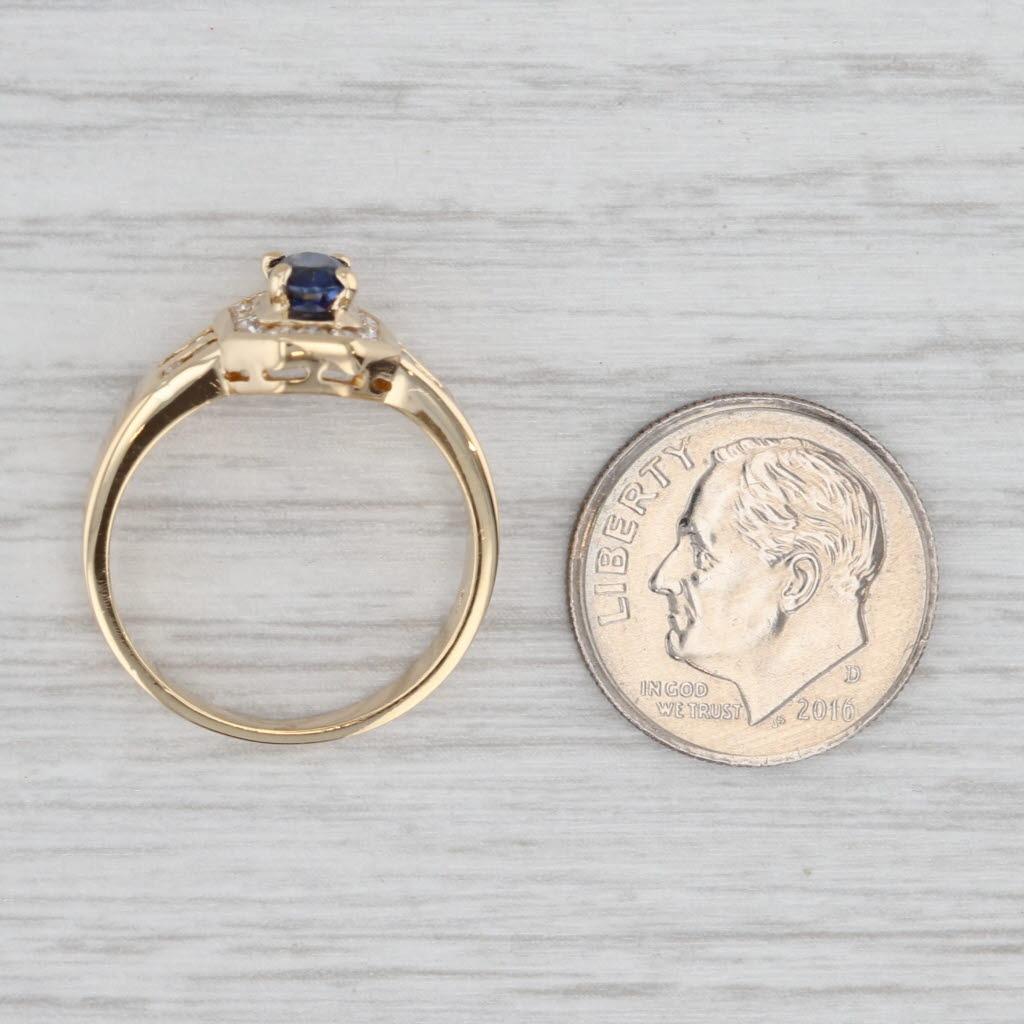 Anello aureolato con diamante e zaffiro blu da 0,68 carati in oro giallo 18 carati, misura 6,5. in vendita 2