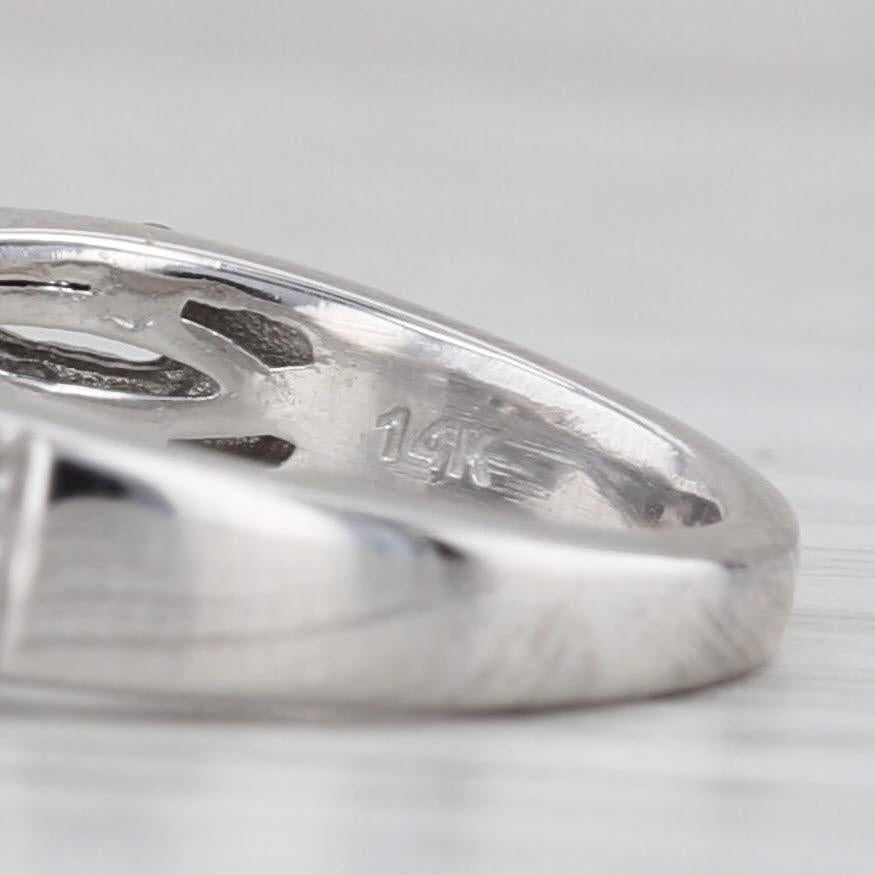 Anello di fidanzamento con diamante aureolato da 0,68 carati in oro bianco 14k, misura 5,5 in vendita 3