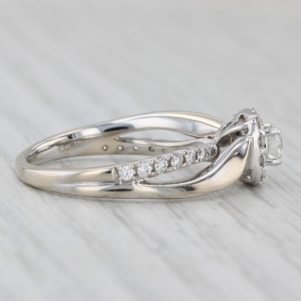 Femenino o masculino 0.68ctw Anillo de compromiso con halo de diamantes redondos Oro blanco 14k Talla 8 en venta