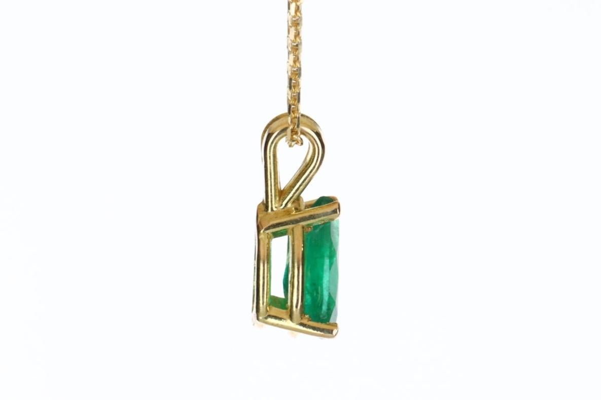 Setting Style: Solitaire - Prong
Setting Material: 14K Yellow Gold
Gold Weight: 1.1 grams

Main Stone: Emerald
Shape: Pear Cut
Approx Weight: 0.69-carats
Color: Green
Clarity: Semi-Transparent
Luster: Very Good
Origin: Colombia
Treatment: Natural,