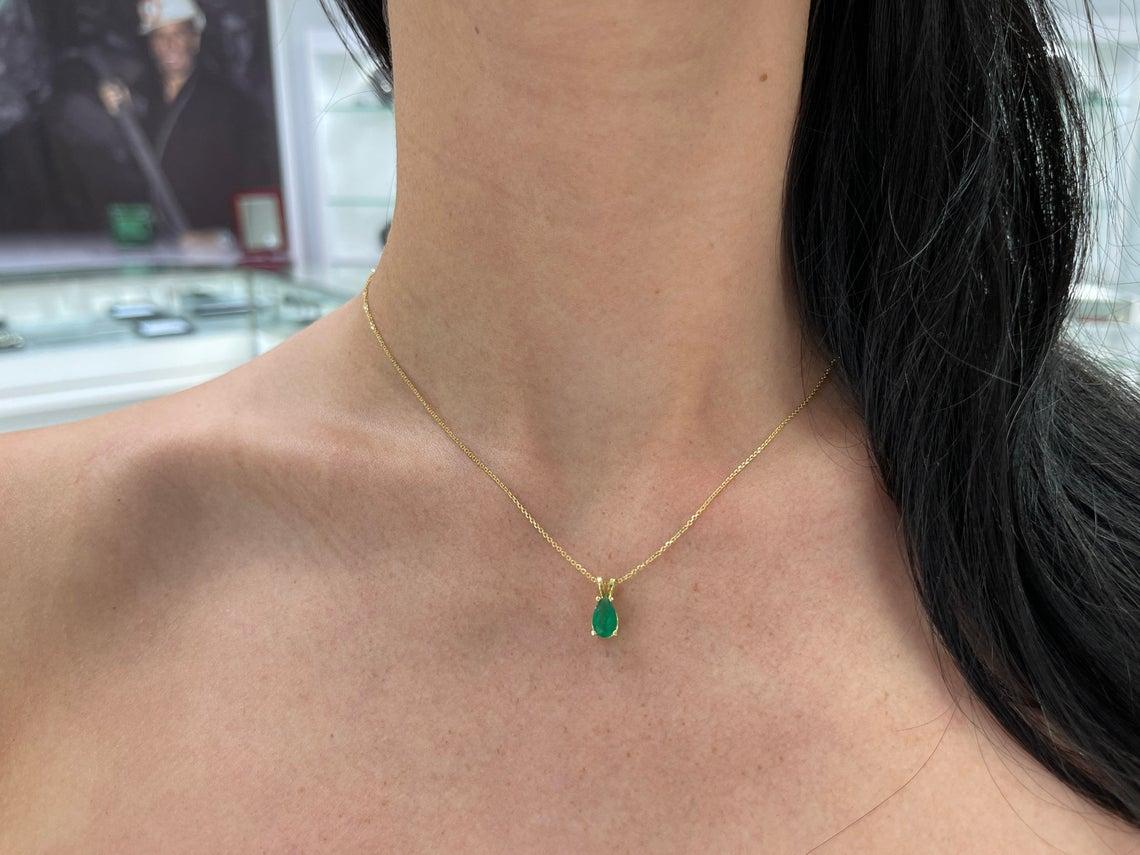 Modern 0.69-Carat 14K Colombian Emerald Solitaire Pear Gold Pendant For Sale