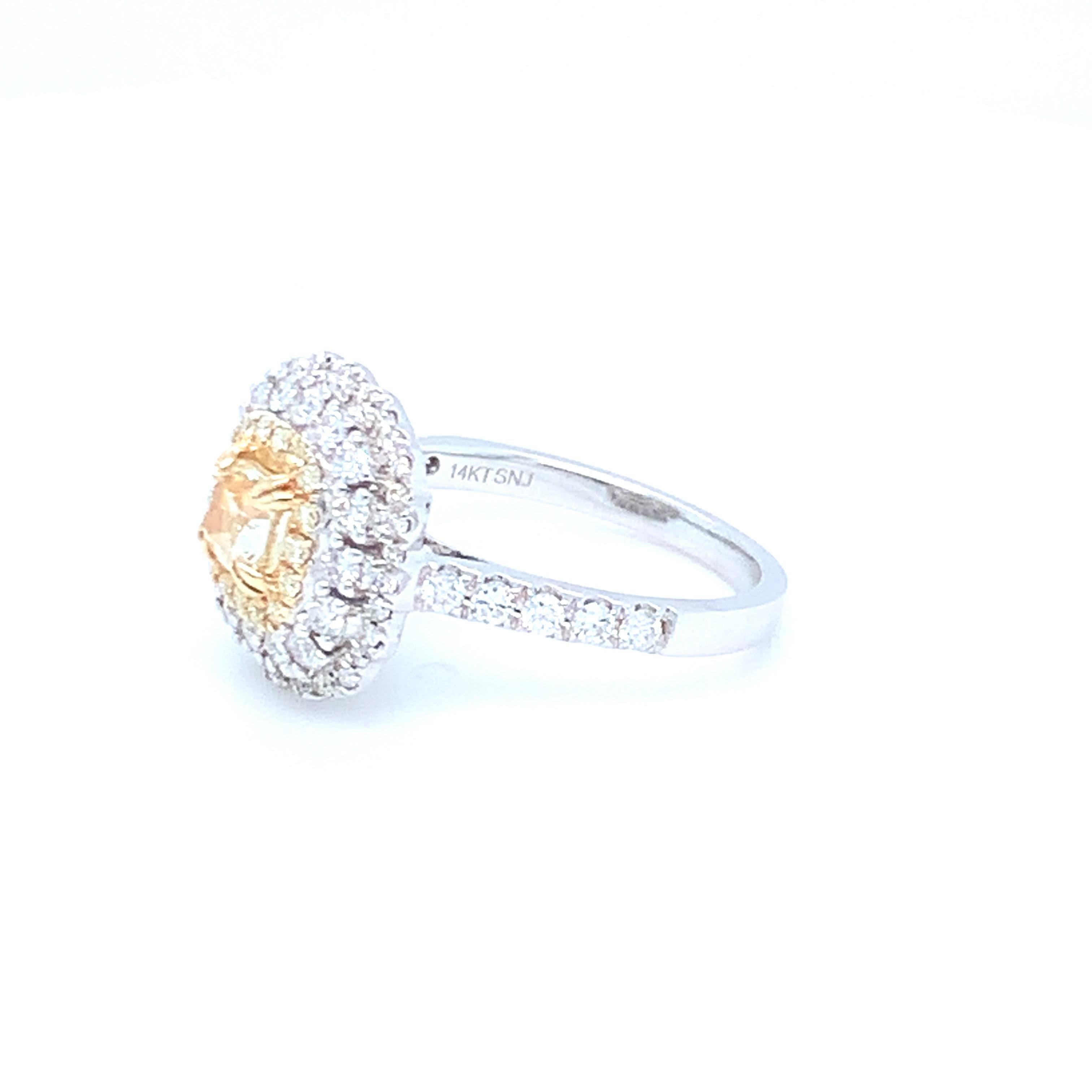 0.69 Carat Cushion Yellow Diamond White Diamond Halo Ring Set in 14 Karat Gold For Sale 4