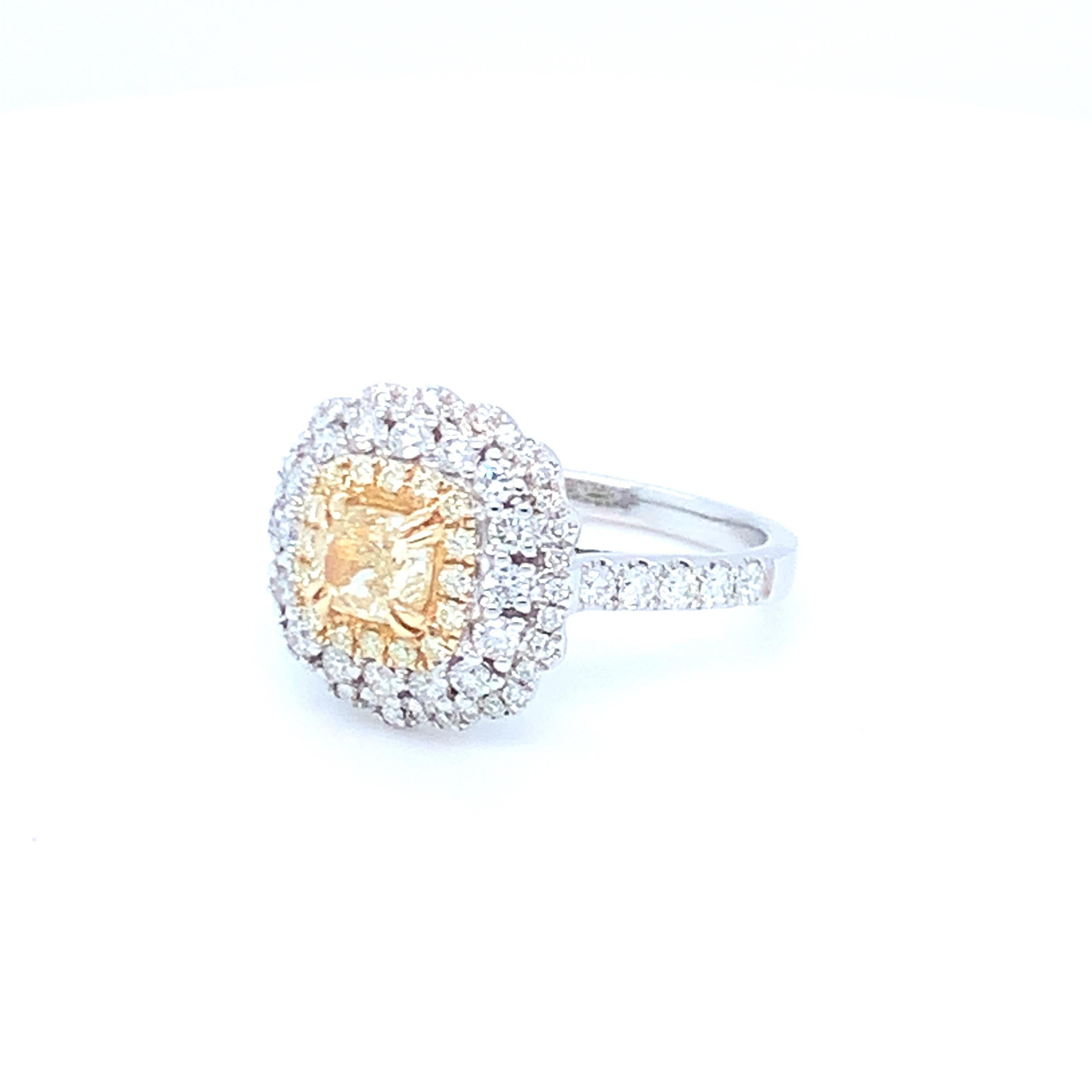 0.69 Carat Cushion Yellow Diamond White Diamond Halo Ring Set in 14 Karat Gold For Sale 5