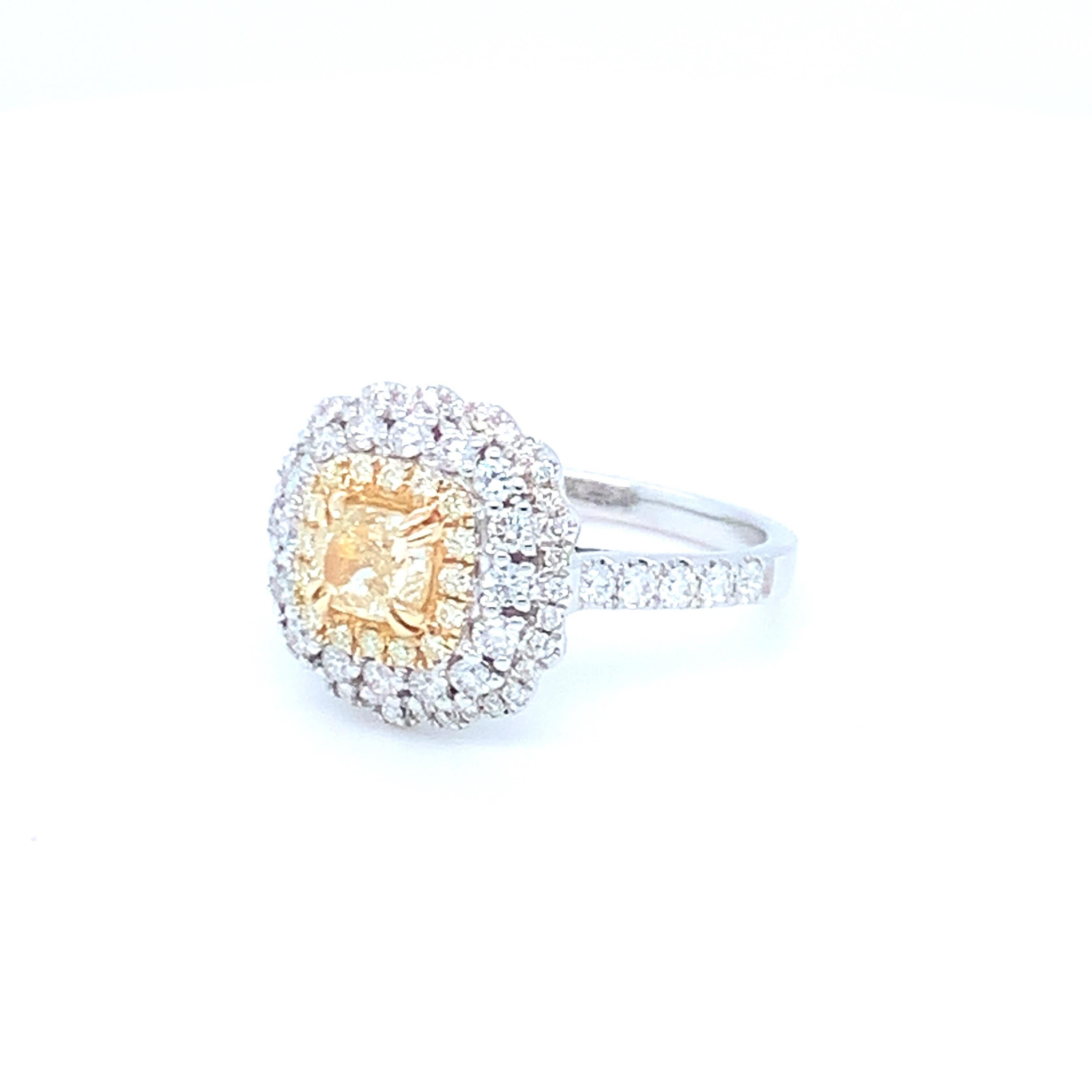 0.69 Carat Cushion Yellow Diamond White Diamond Halo Ring Set in 14 Karat Gold For Sale 6