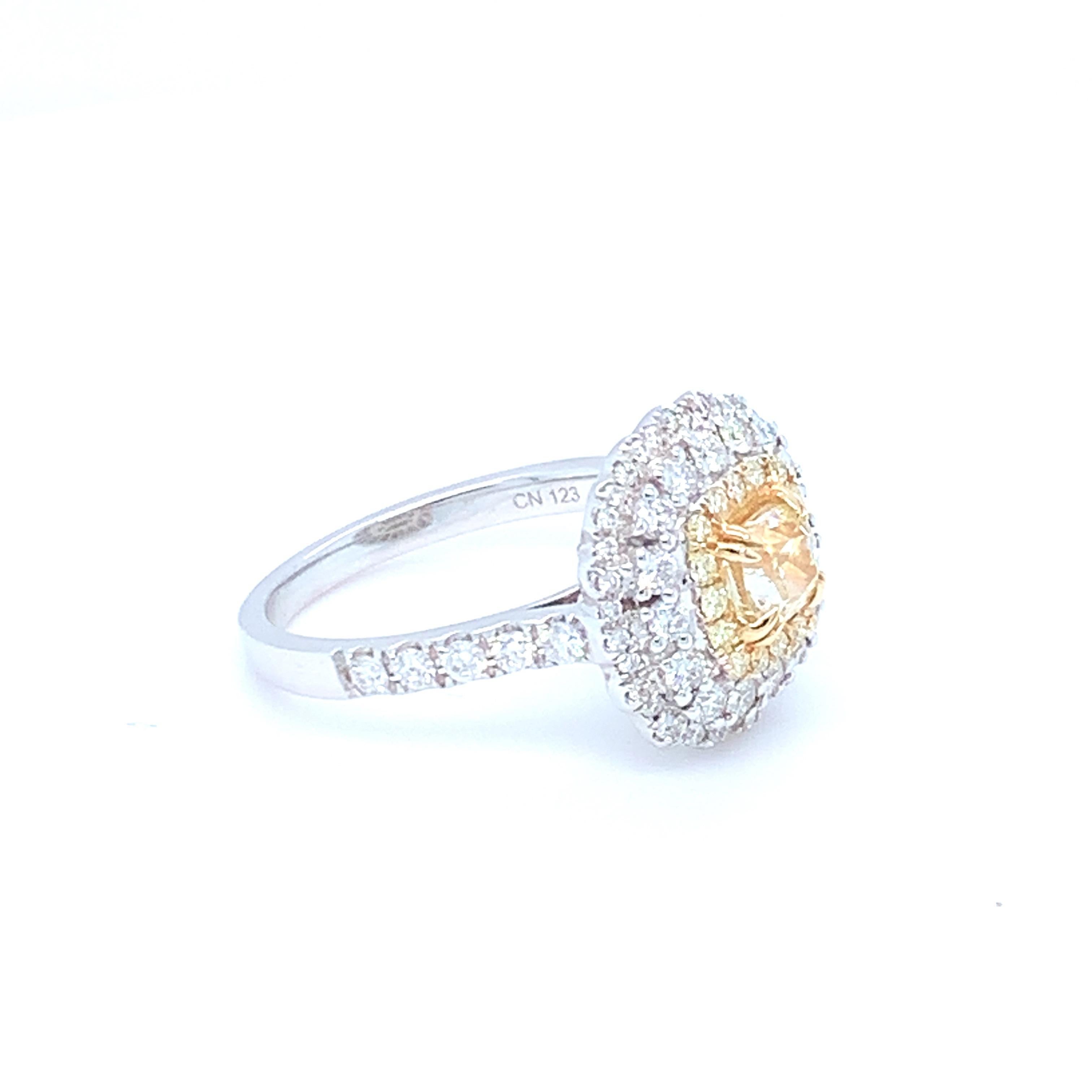 Artisan 0.69 Carat Cushion Yellow Diamond White Diamond Halo Ring Set in 14 Karat Gold For Sale
