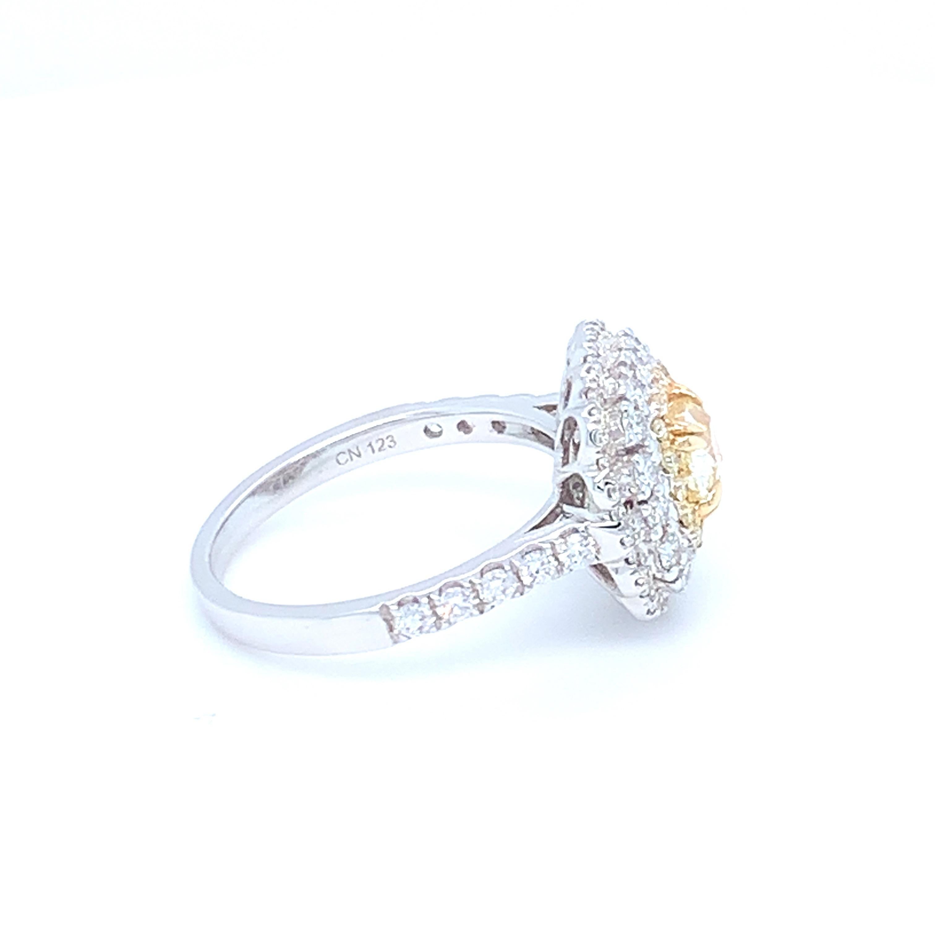 Cushion Cut 0.69 Carat Cushion Yellow Diamond White Diamond Halo Ring Set in 14 Karat Gold For Sale