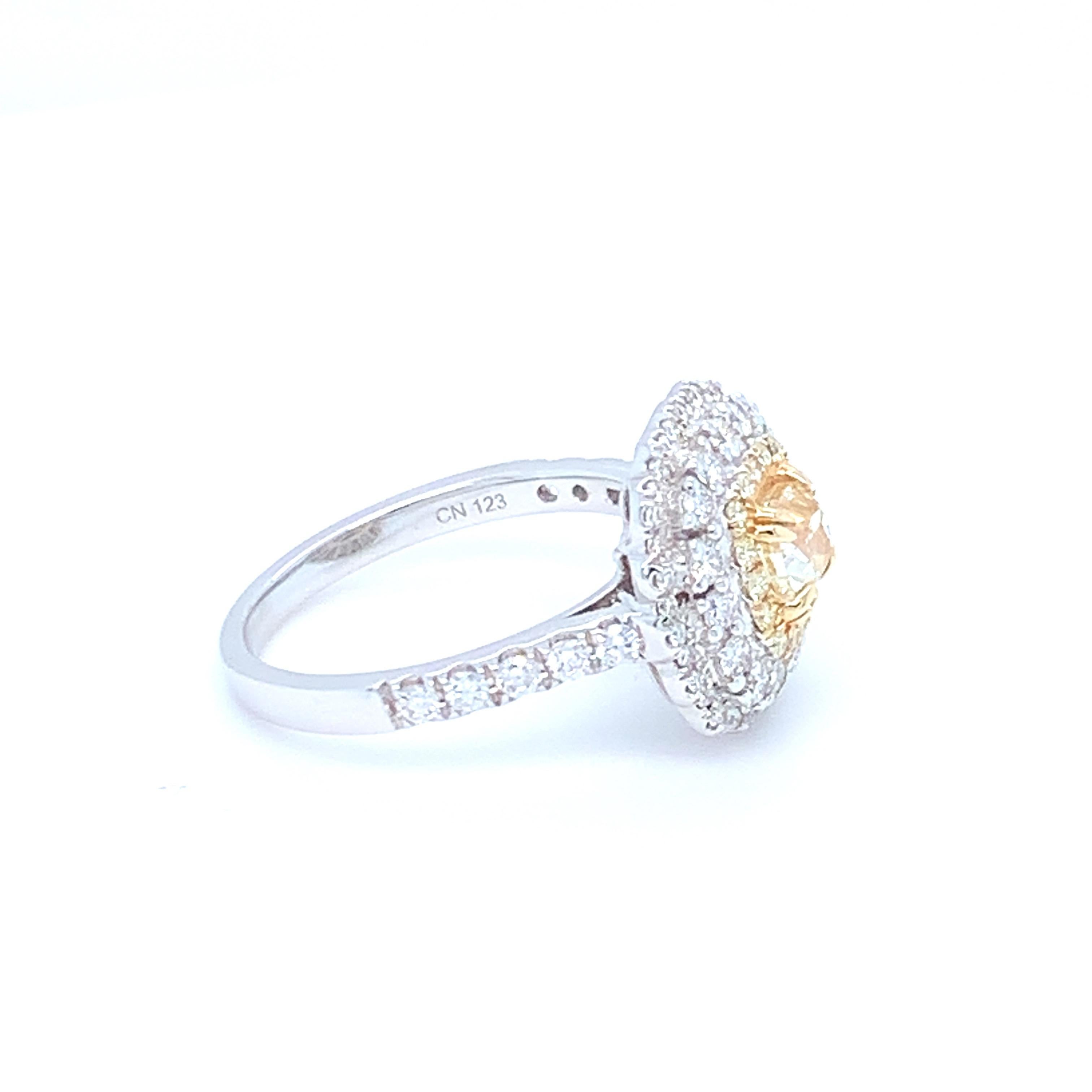 0.69 Carat Cushion Yellow Diamond White Diamond Halo Ring Set in 14 Karat Gold In New Condition For Sale In Trumbull, CT