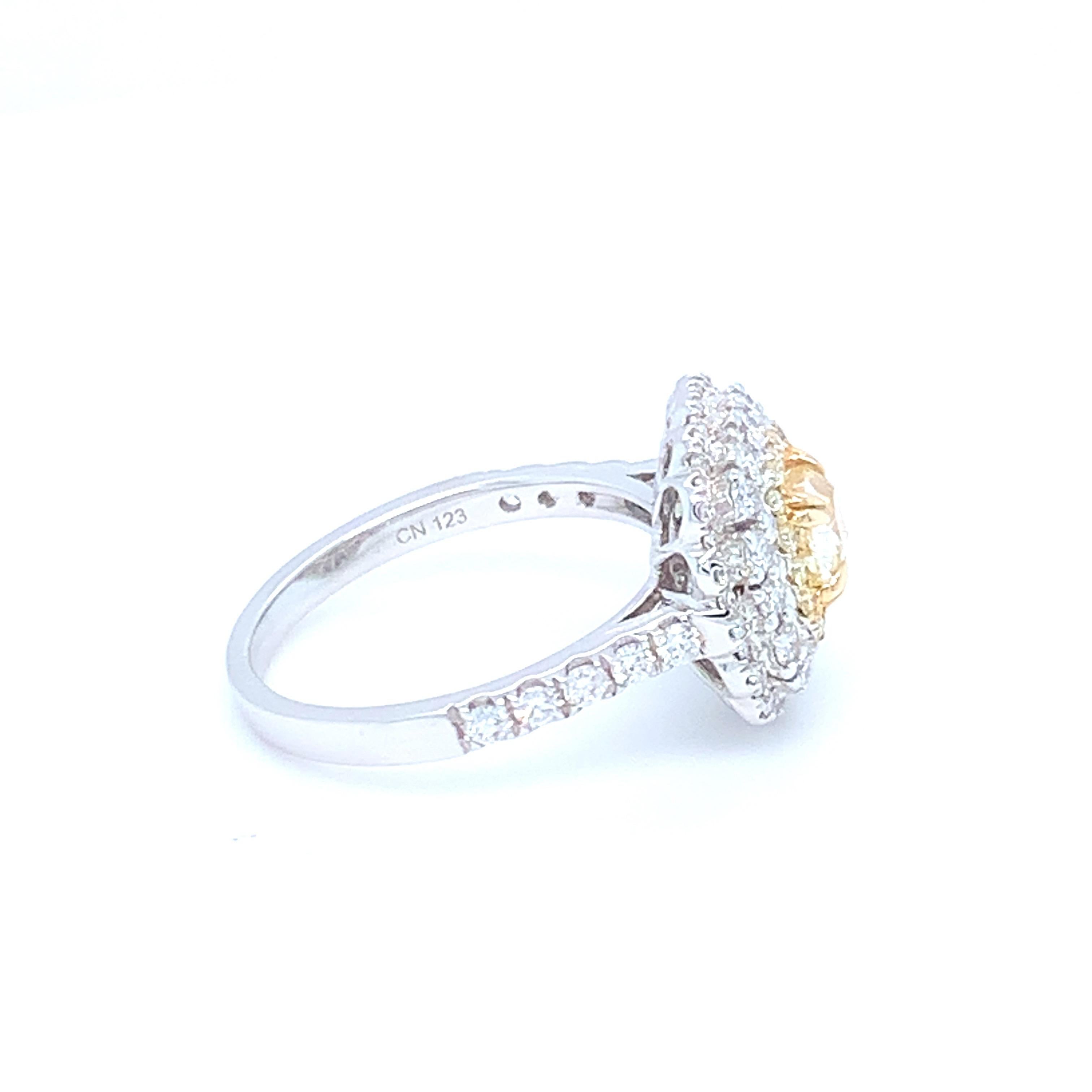 Women's 0.69 Carat Cushion Yellow Diamond White Diamond Halo Ring Set in 14 Karat Gold For Sale