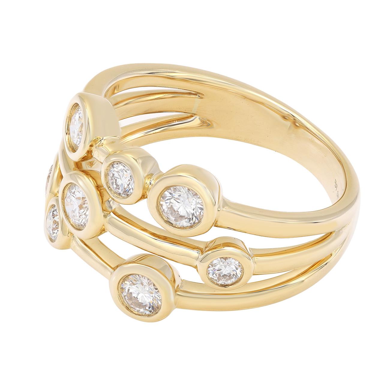 Introducing the modern and elegant 0.69 Carat Diamond Bubble Ring in 18K Yellow Gold. This bezel set diamond ring is a true symbol of celebrating life's precious milestones. Crafted with care in 18K gold, it features a continuous arrangement of