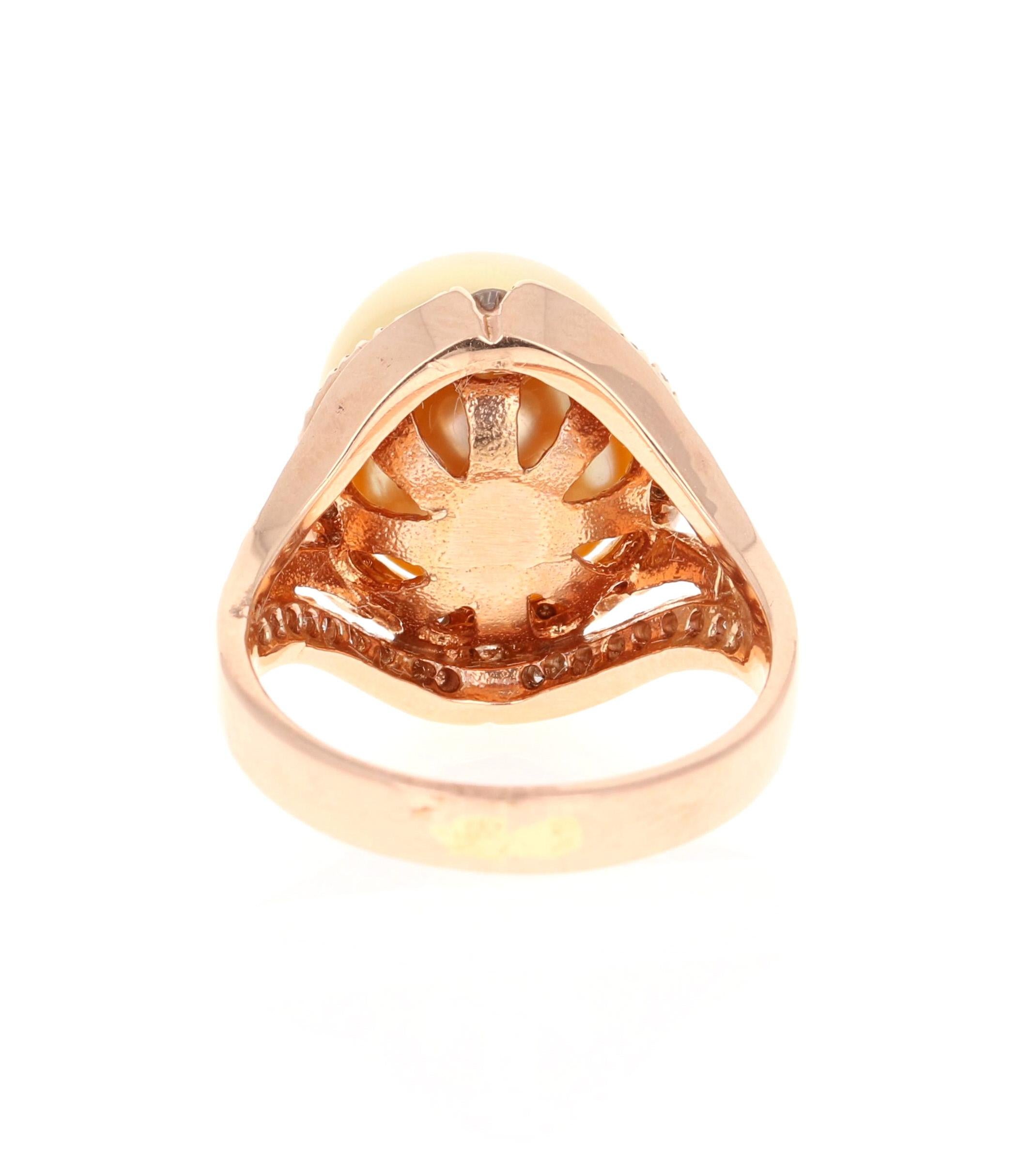 Taille ronde Bague en or rose 14 carats avec diamants de 0,69 carat et perle des mers du Sud en vente