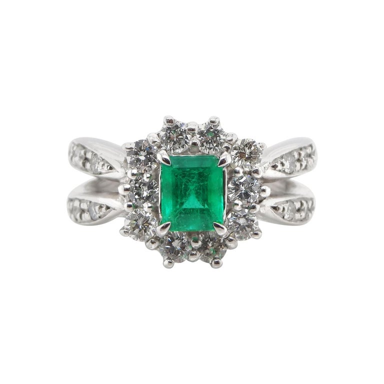 0.69 Carat Emerald and Diamond Cluster Ring Set in Platinum For Sale at ...
