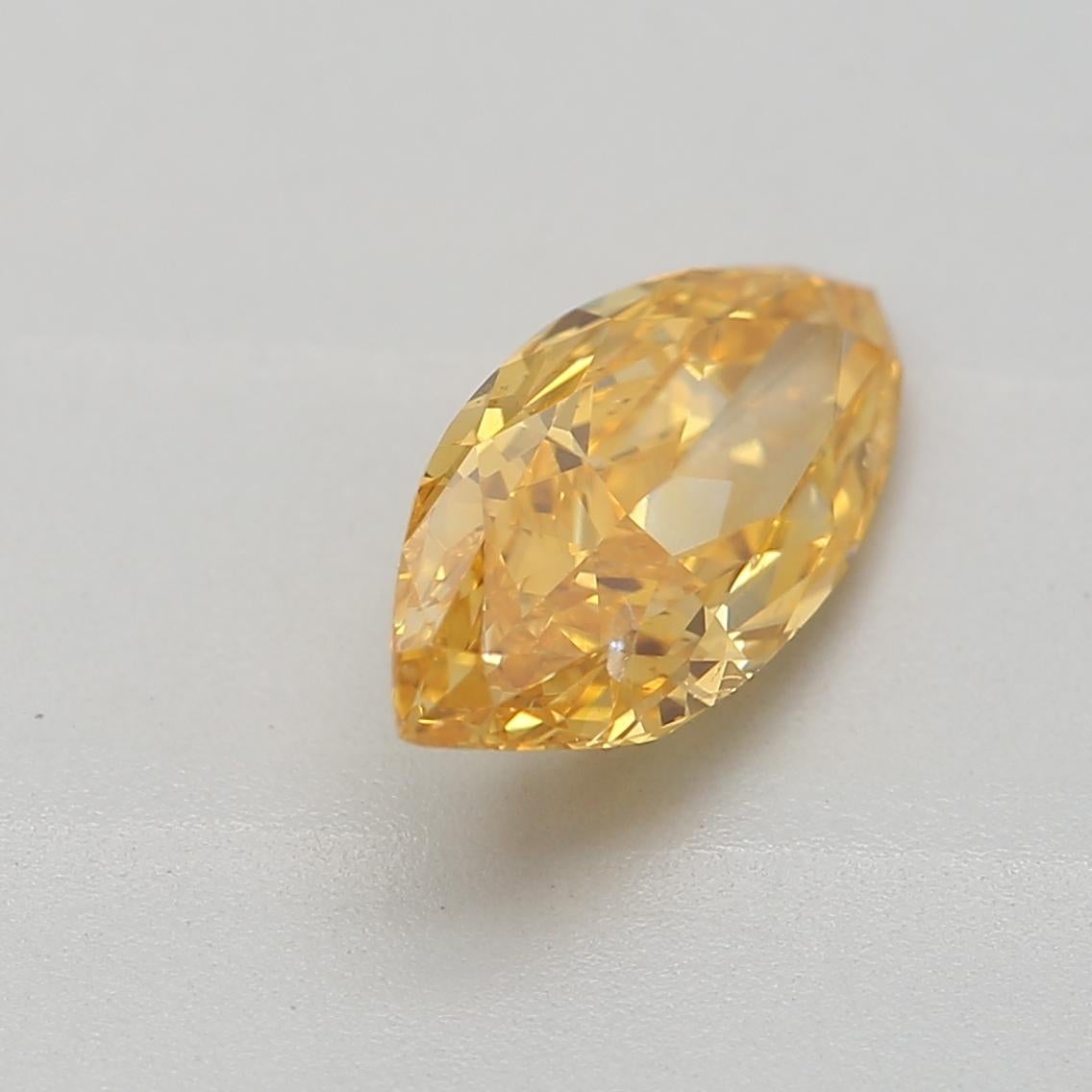 0,69 carat, FANCY VIVID orange-jaune, diamant taillé Clarté I1 certifié GIA Unisexe en vente
