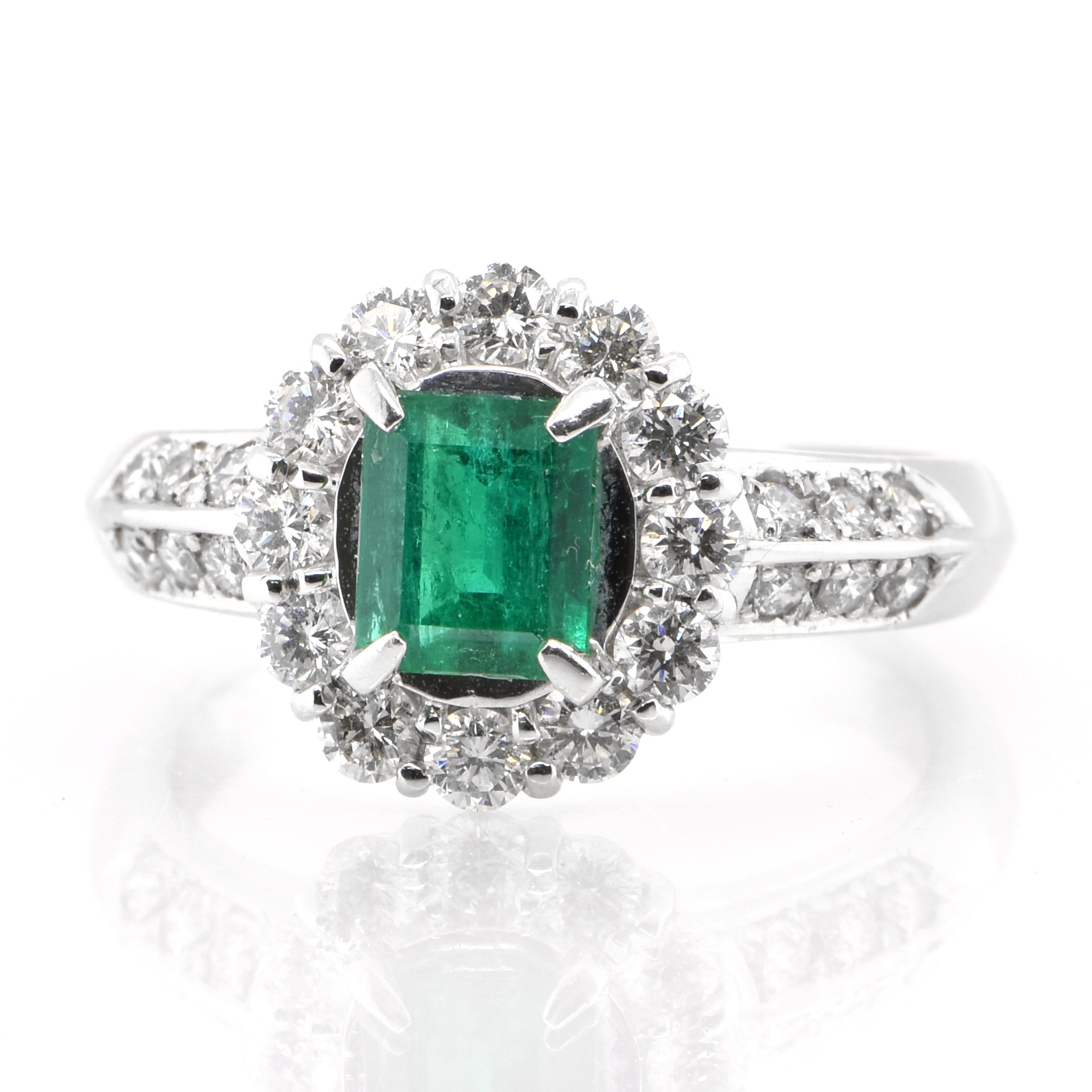 A stunning Engagement Ring featuring a 0.69 Carat Natural Emerald and 0.73 Carats of Diamond Accents set in Platinum. People have admired emerald’s green for thousands of years. Emeralds have always been associated with the lushest landscapes and