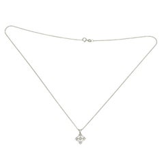 0.69 Carat Round and Baguette Diamonds in 14 Karat Gold Flower Necklace