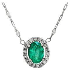 0.69 Carat Colombian Emerald 0.18 Carat Diamonds 18 Karat White Gold Necklace