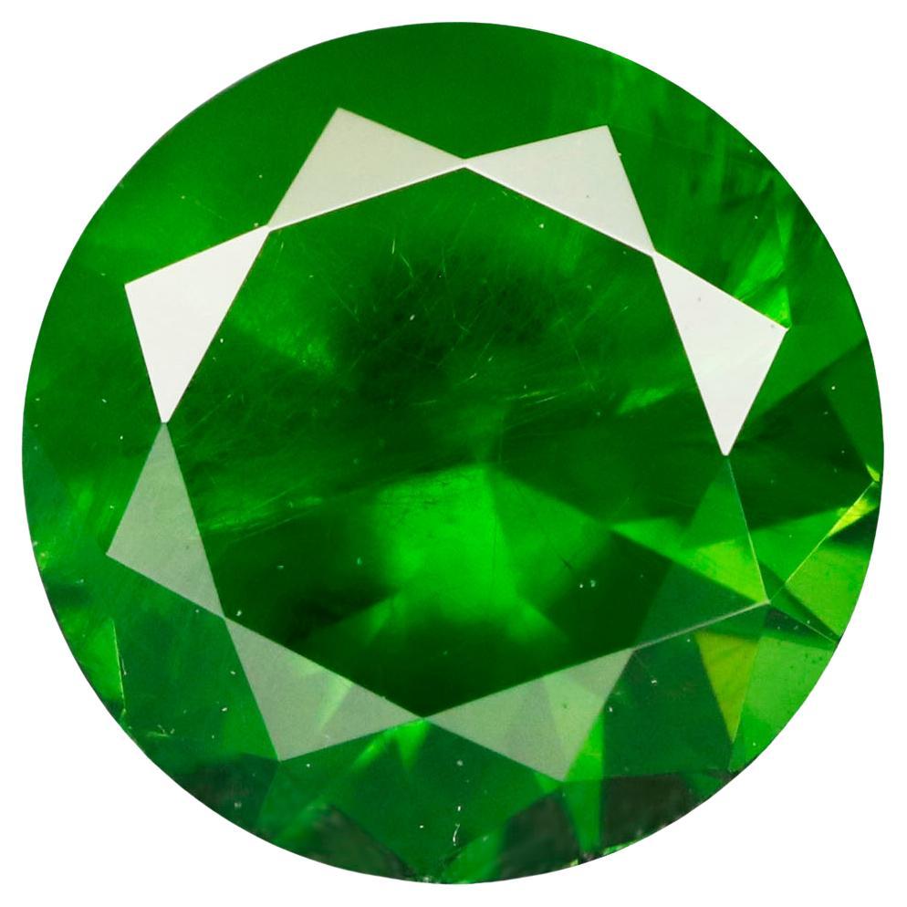 Pierre précieuse non sertie d'une queue de cheval incluse, grenat démantoïde russe de 0.69 carat