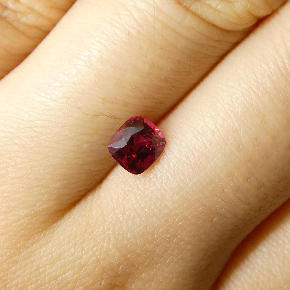 Description:

Gem Type: Jedi Spinel 
Number of Stones: 1
Weight: 0.69 cts
Measurements: 5.28 x 4.74 x 3.65 mm
Shape: Cushion
Cutting Style Crown: Brilliant Cut
Cutting Style Pavilion: Step Cut 
Transparency: Transparent
Clarity: Very Slightly