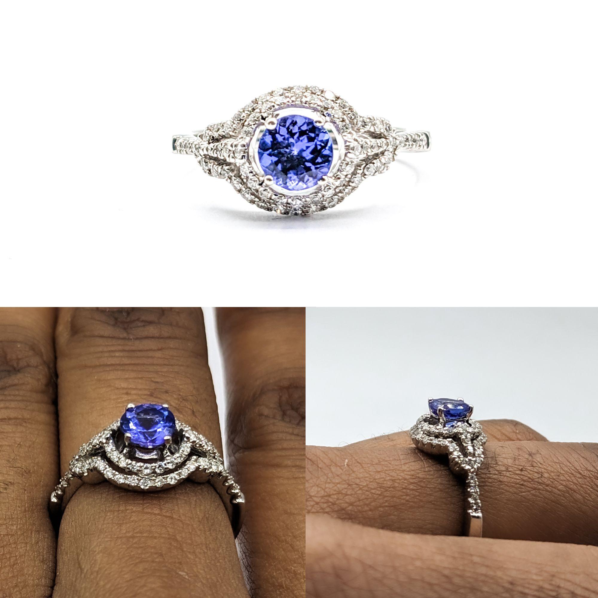 0.69ct Tanzanite & Diamond Ring In White Gold


This exquisite gemstone fashion ring is elegantly crafted in 14kt white gold, featuring a magnificent 0.69ct tanzanite centerpiece. Complementing the vivid blue-violet hues of the tanzanite are 0.31ctw