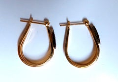 Orecchini con diamanti naturali da .06ct in oro 14kt Semi Hoop
