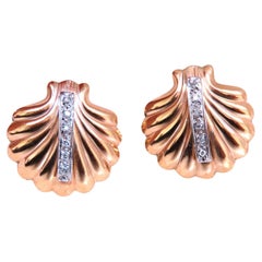 .06ct Natural diamond earrings 14kt yellow gold*