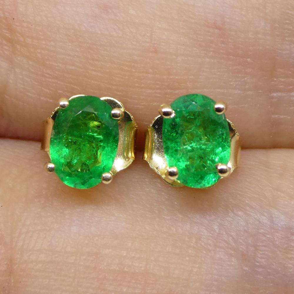 These two Emerald's are set in a pair of 14k Yellow Gold stud earrings settings with butterfly backs.

These are made in Toronto, Canada, and are incredibly fine quality!

Description:

Stone Type: Emerald
Number of Stones: 2
Weight: 0.6 carats
