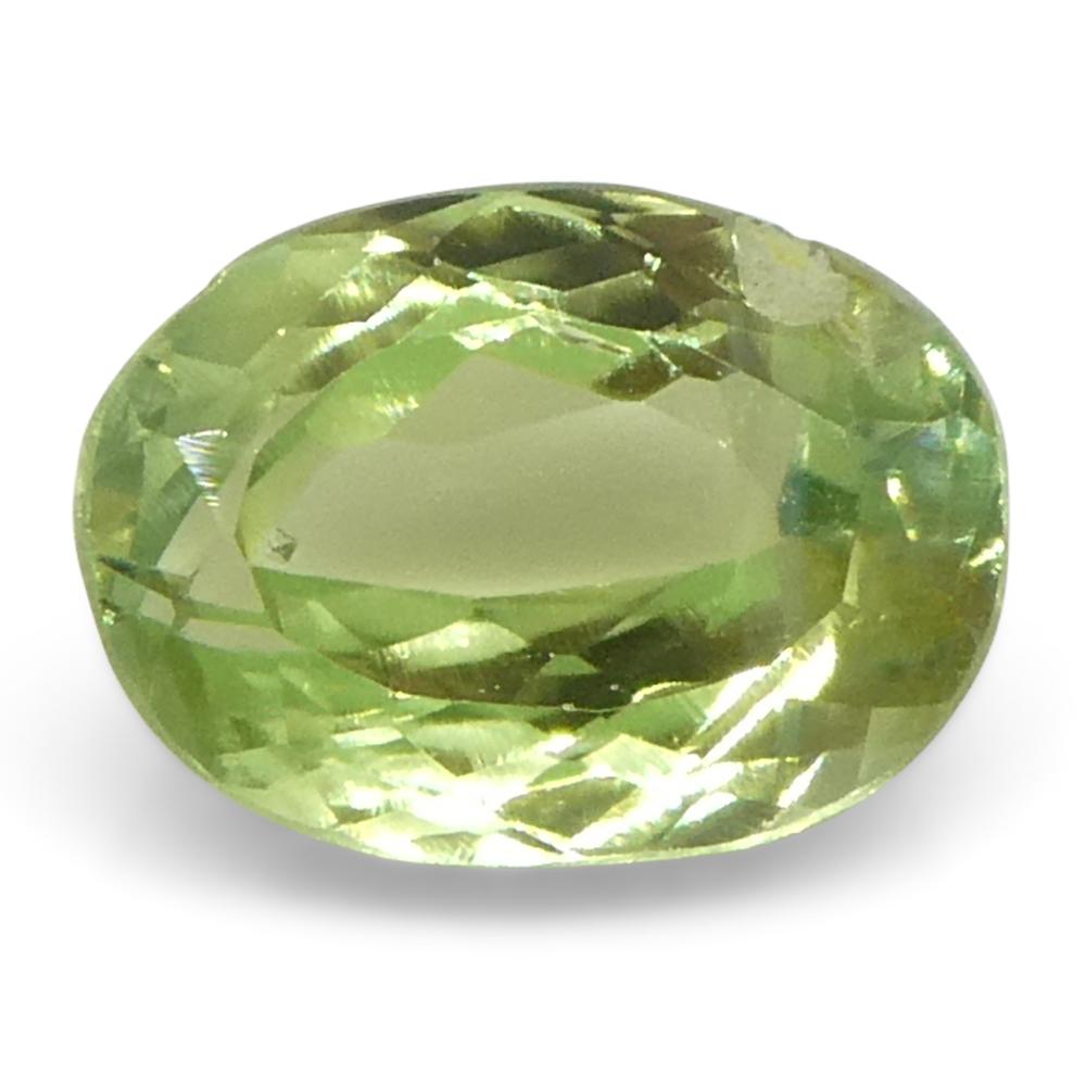 0.6ct Oval Yellowish Green to Greyish Purple Alexandrite from Brazil For Sale 1