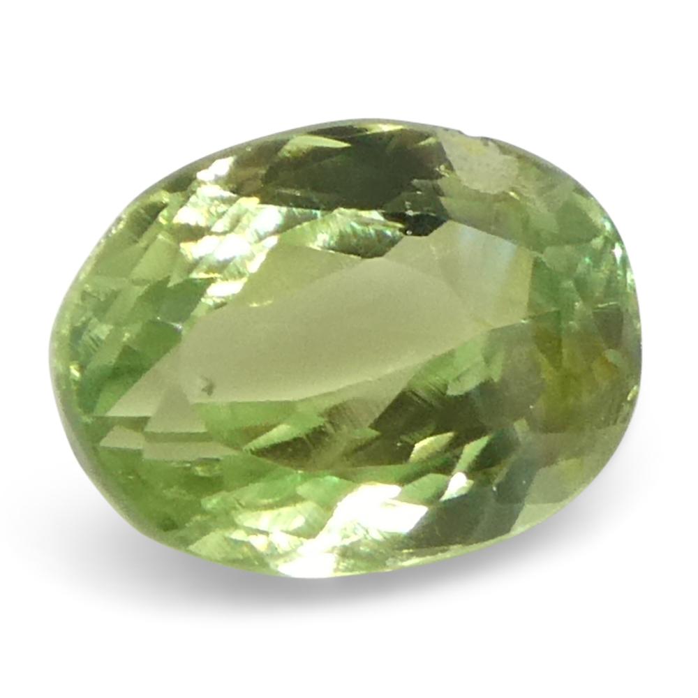 0.6ct Oval Yellowish Green to Greyish Purple Alexandrite from Brazil For Sale 2