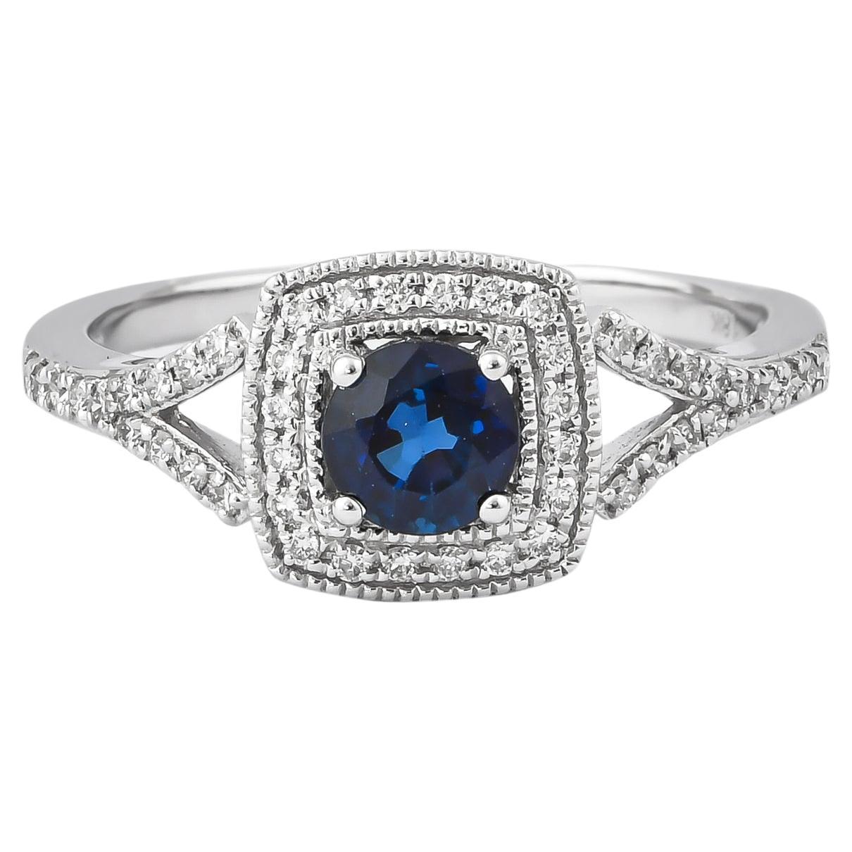 0.7 Carat Blue Sapphire and Diamond Ring in 18 Karat White Gold For Sale