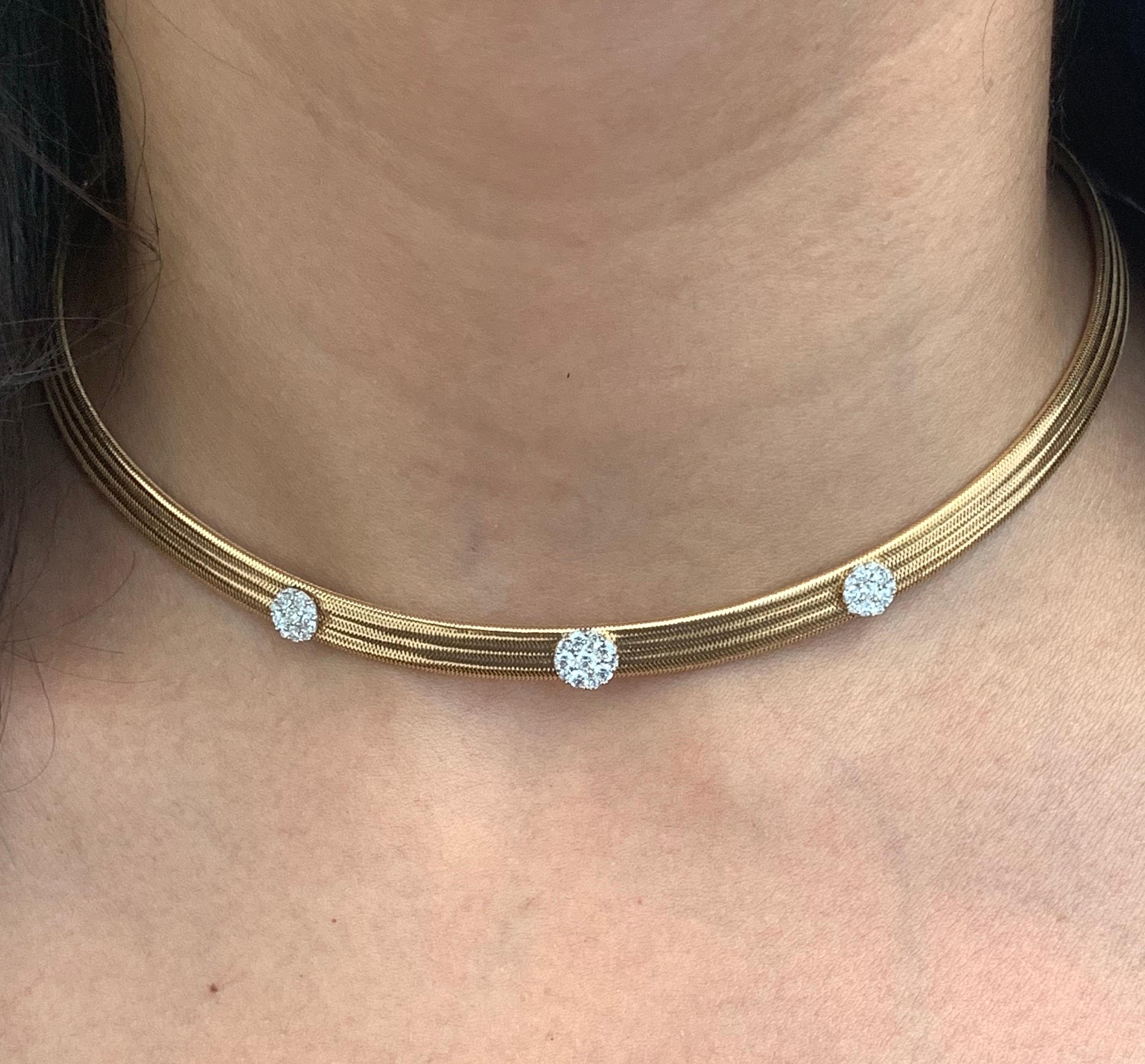 Material: 18K Two Tone Gold 
Diamond Details: 32 Brilliant Round White Diamonds at 0.7 Carats - Clarity: SI / Color: H-I

The choker is 13.5 inches long with 2.5 inches of chain in the back which allows it to be worn anywhere from 13.5 inches to 16