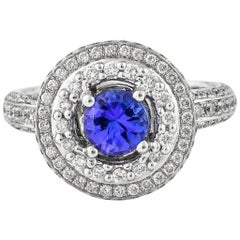 0.7 Carat Tanzanite and White Diamond Ring in 14 Karat White Gold