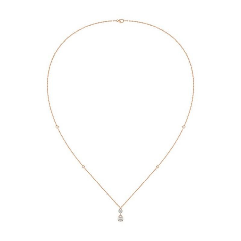 Poids total en carats :
Ce collier pendentif exquis de la Collection S/One présente un poids total de 0,7 carat, mettant en valeur l'éclat de diamants soigneusement sélectionnés dans un design sophistiqué à deux gouttes.

Les diamants :
Le pendentif