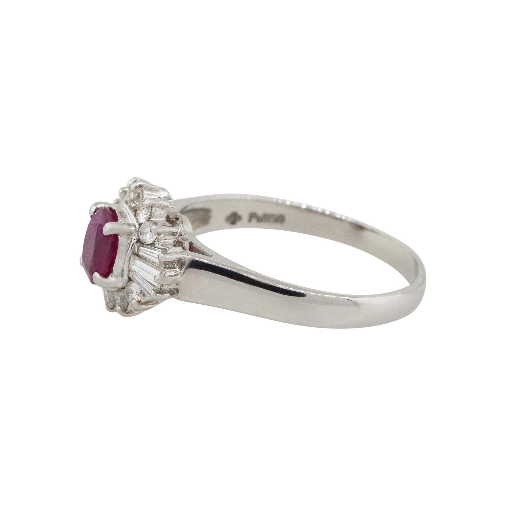 Material: Platinum
Gemstone details: Approx. 0.70 oval cut Ruby gemstone
Diamond details: Approx. 0.43ctw of round and baguette cut diamonds. Diamonds are G/H in color and VS in clarity
Ring Size: 7.25 
Ring Measurements: 0.75