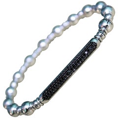 0.70 Carat Black Diamonds White 18 Karat Gold Beaded Bracelet Titanium Spring