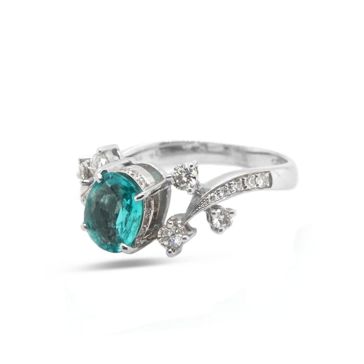 A beautiful neon color Brazilian Paraiba is set along with few pieces of white brilliant round diamond. “Paraíba” tourmaline is by far the most valuable, and perhaps the most popular, of all tourmaline gem varieties. The details of the ring are