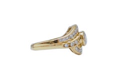 0.70 Carat Central Diamond, Diamonds, 18 Kt Yellow Gold Ring.