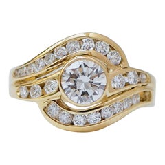 0.70 Carat Central Diamond, Diamonds, 18 Kt Yellow Gold Ring.