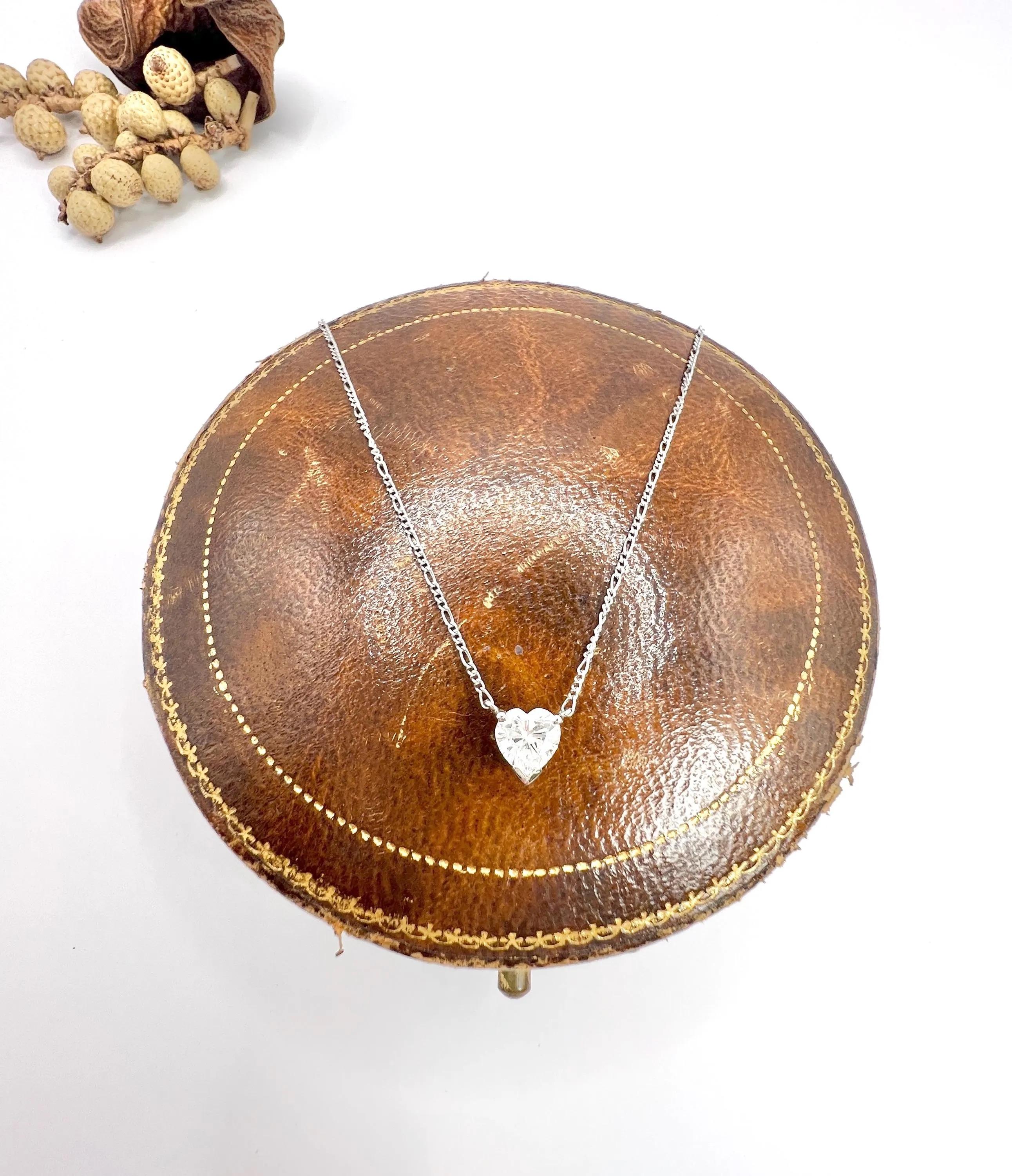 0.70 Carat Diamond Heart Pendant Necklace Suspended from a Platinum Figaro Chain For Sale 5