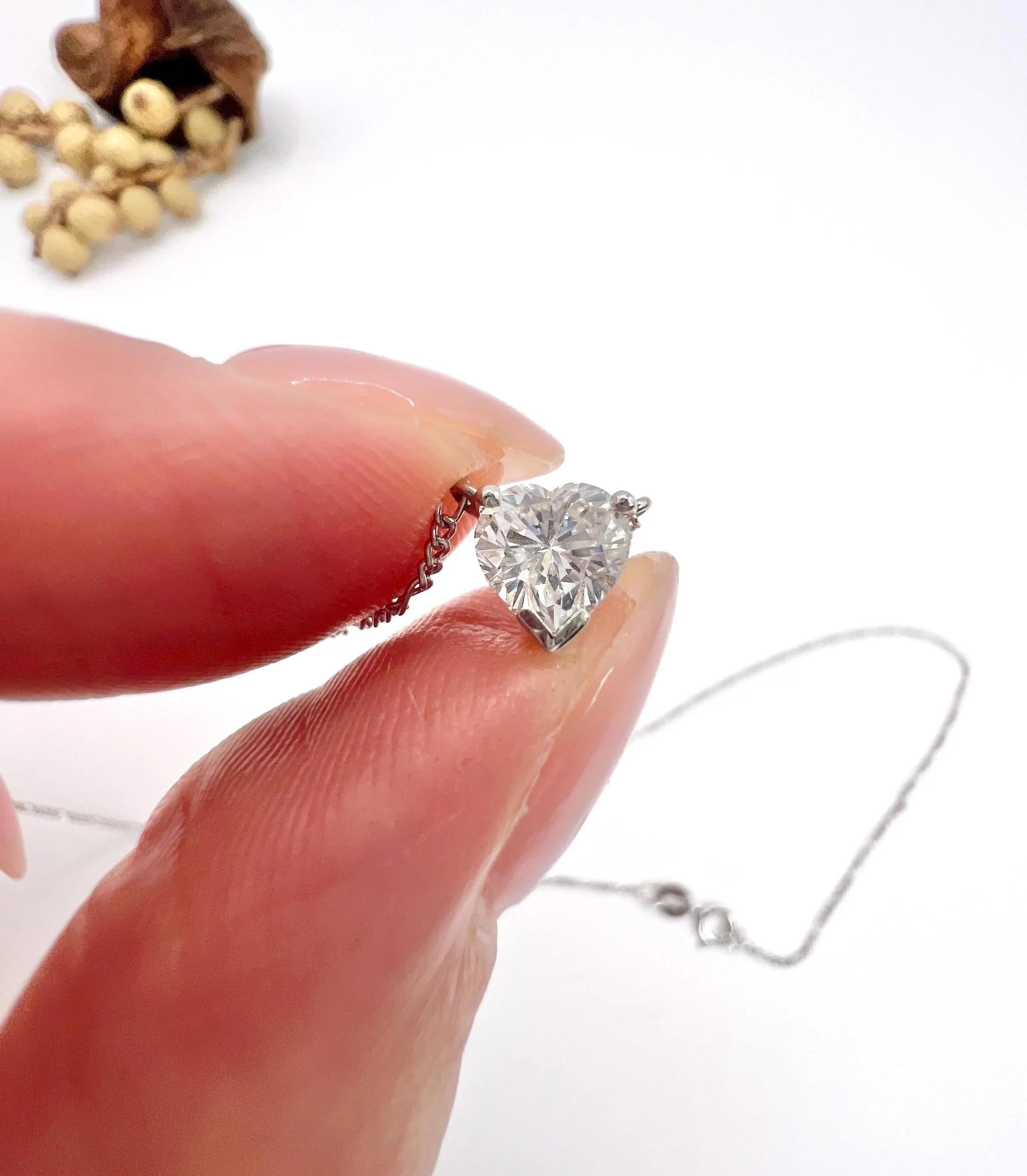 0.70 Carat Diamond Heart Pendant Necklace Suspended from a Platinum Figaro Chain For Sale 6