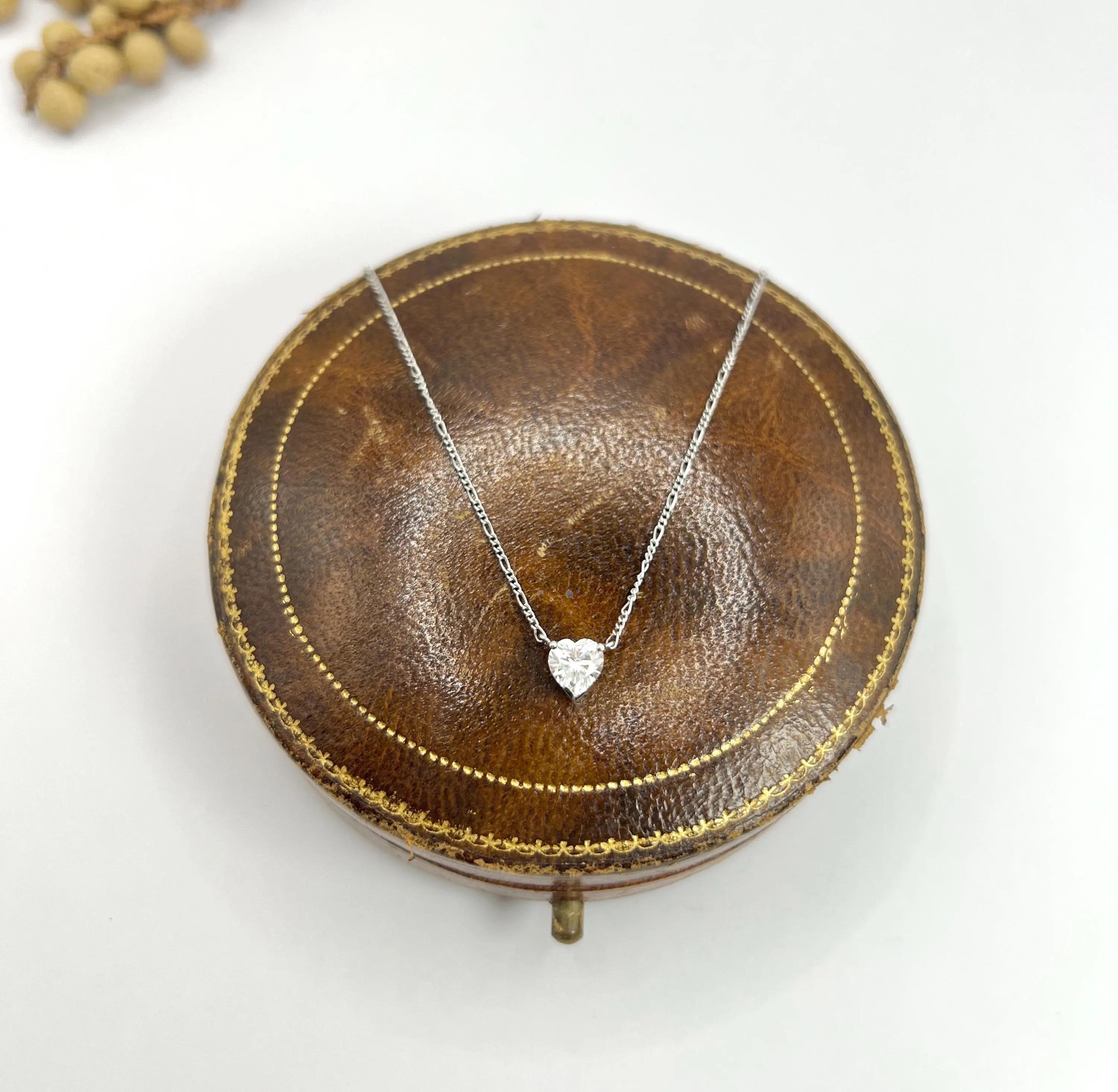 0.70 Carat Diamond Heart Pendant Necklace Suspended from a Platinum Figaro Chain In Excellent Condition For Sale In Brighton, GB