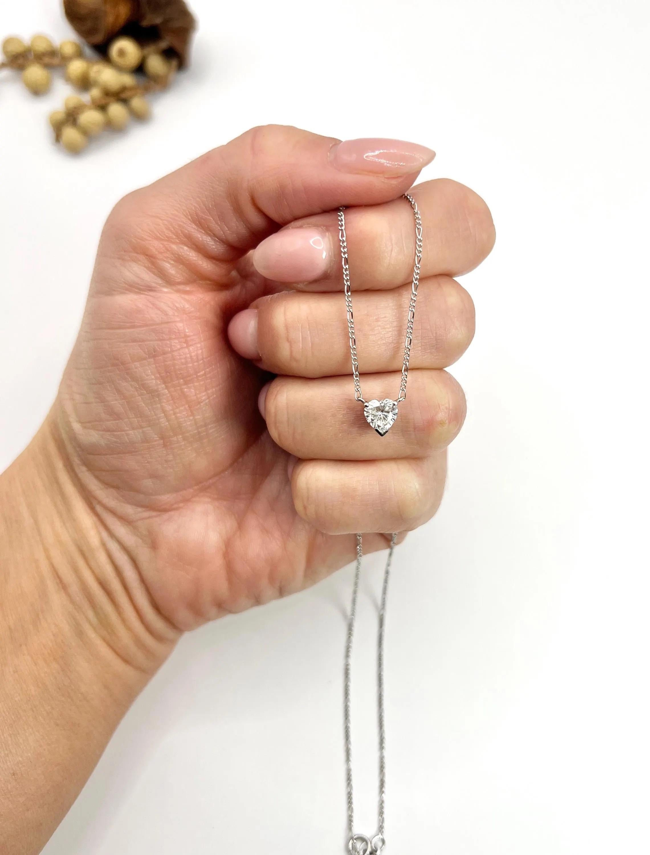 0.70 Carat Diamond Heart Pendant Necklace Suspended from a Platinum Figaro Chain For Sale 2
