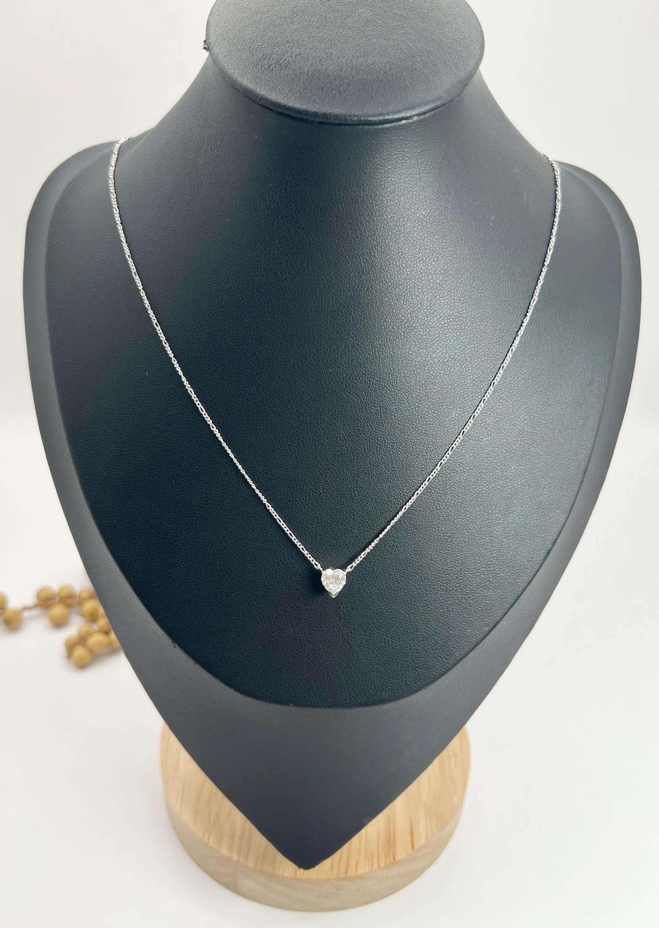 0.70 Carat Diamond Heart Pendant Necklace Suspended from a Platinum Figaro Chain For Sale 4