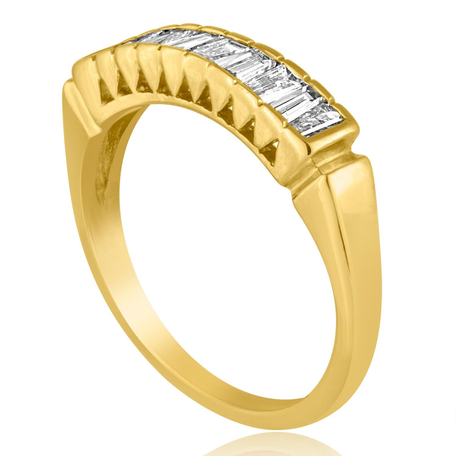 Very Beautiful Half Band Baguette Ring
The ring is 14K Yellow Gold
There are 0.70 Carats in Diamonds F/G VS
The ring weighs 2.1 grams
The ring is a size 4, sizable 1 size up/down.