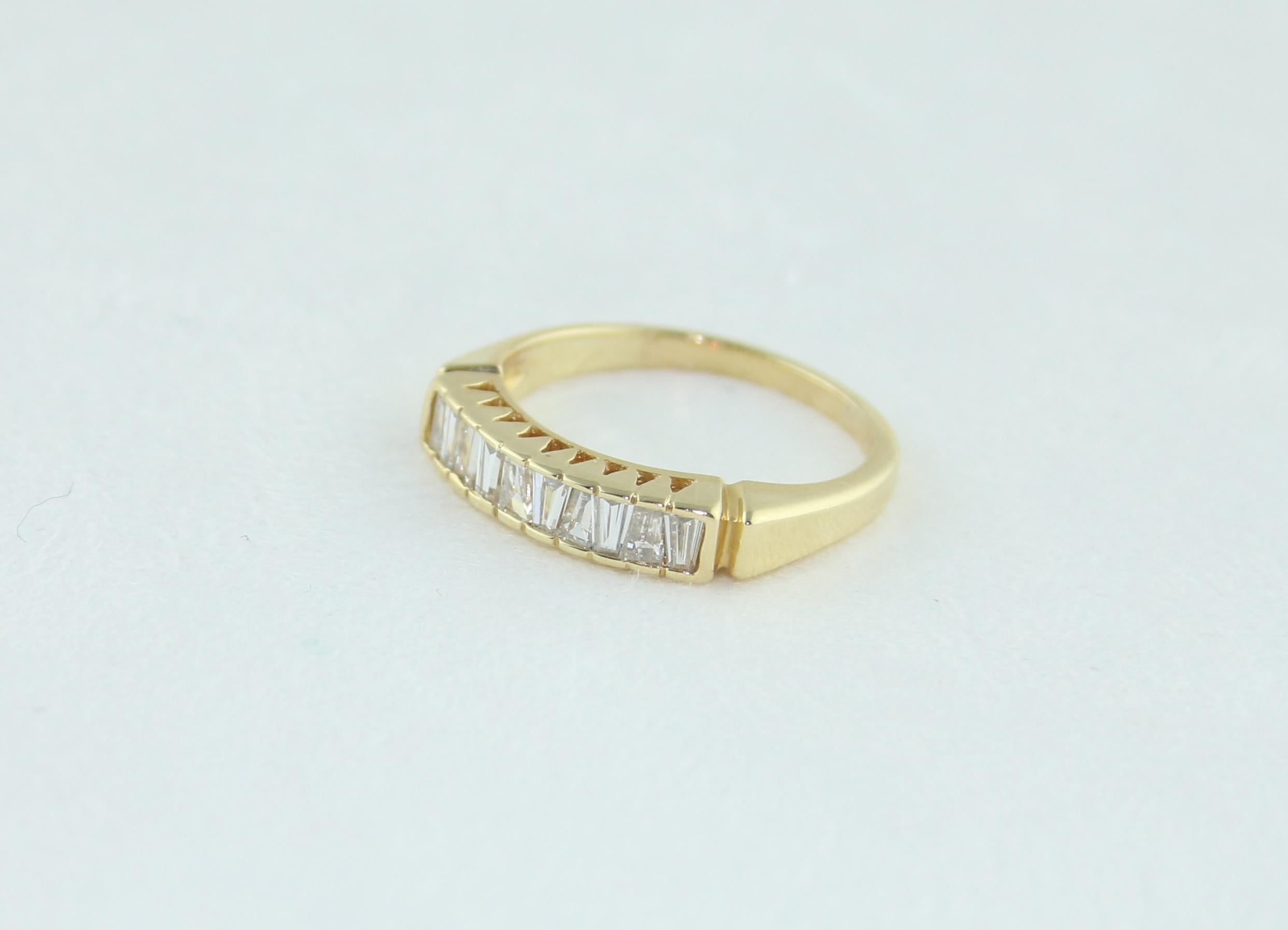 Women's 0.70 Carat Diamond Tapered Baguettes Gold Half Band Ring For Sale