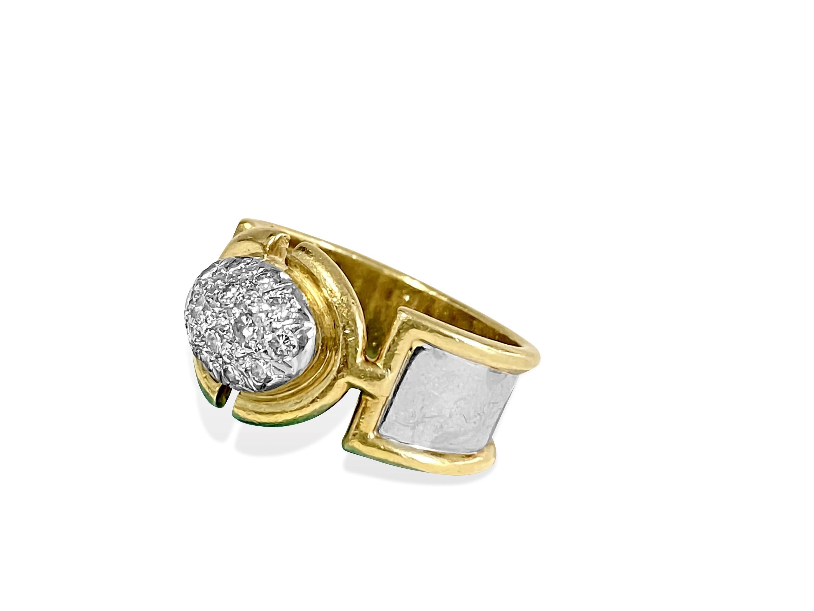 Metal: 18k yellow and white gold.
Total carat weight of diamonds: 0.70 carats. VS clarity and F-G color. Round brilliant cut diamonds. All diamonds are 100% natural earth mined. 

This is a vintage ladies art nouveau diamond and gold ring. 

Perfect
