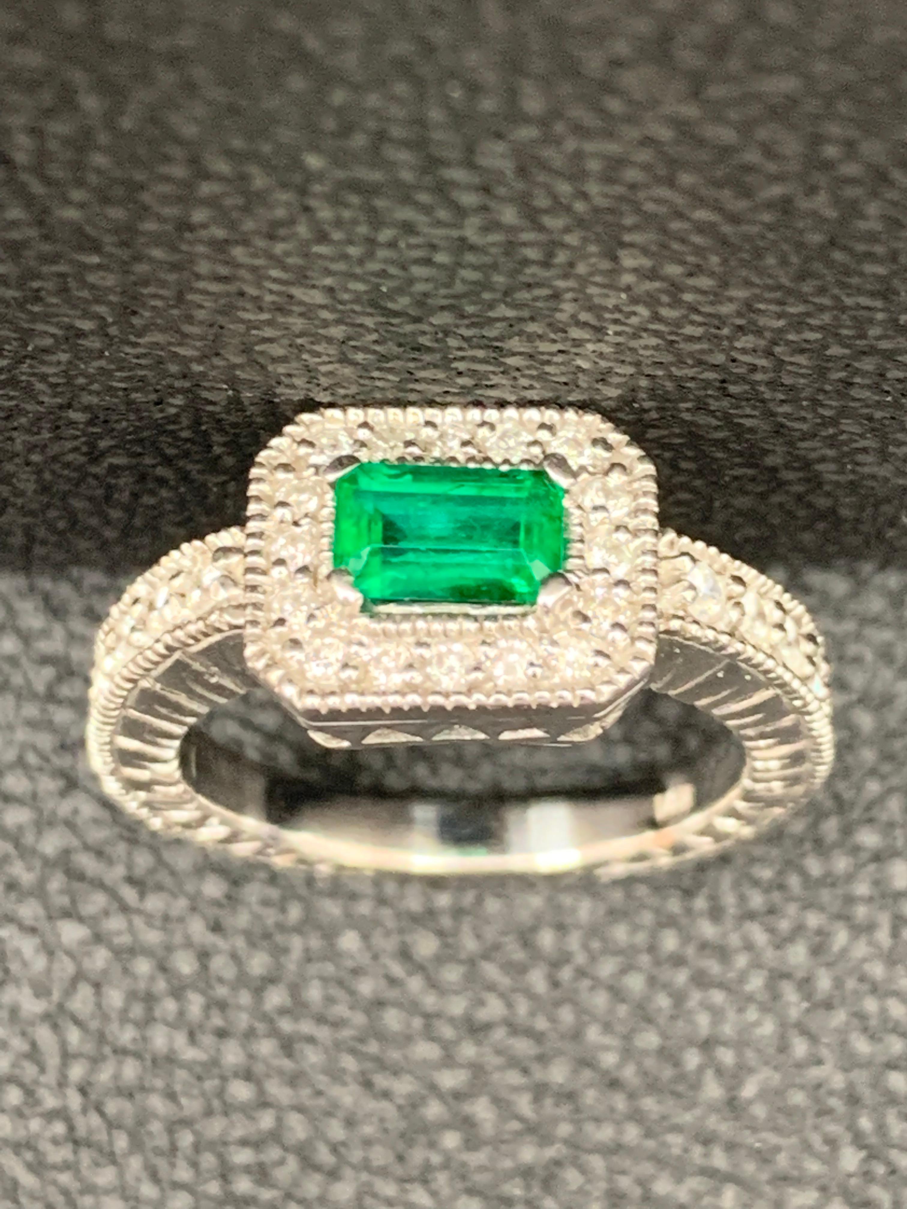 0.70 Carat Emerald-Cut Emerald and Diamond Ring in 14K White Gold For Sale 1