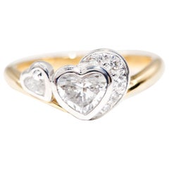 0.70 Carat Heart Brilliant Cut 18 Carat Yellow and White Gold Engagement Ring