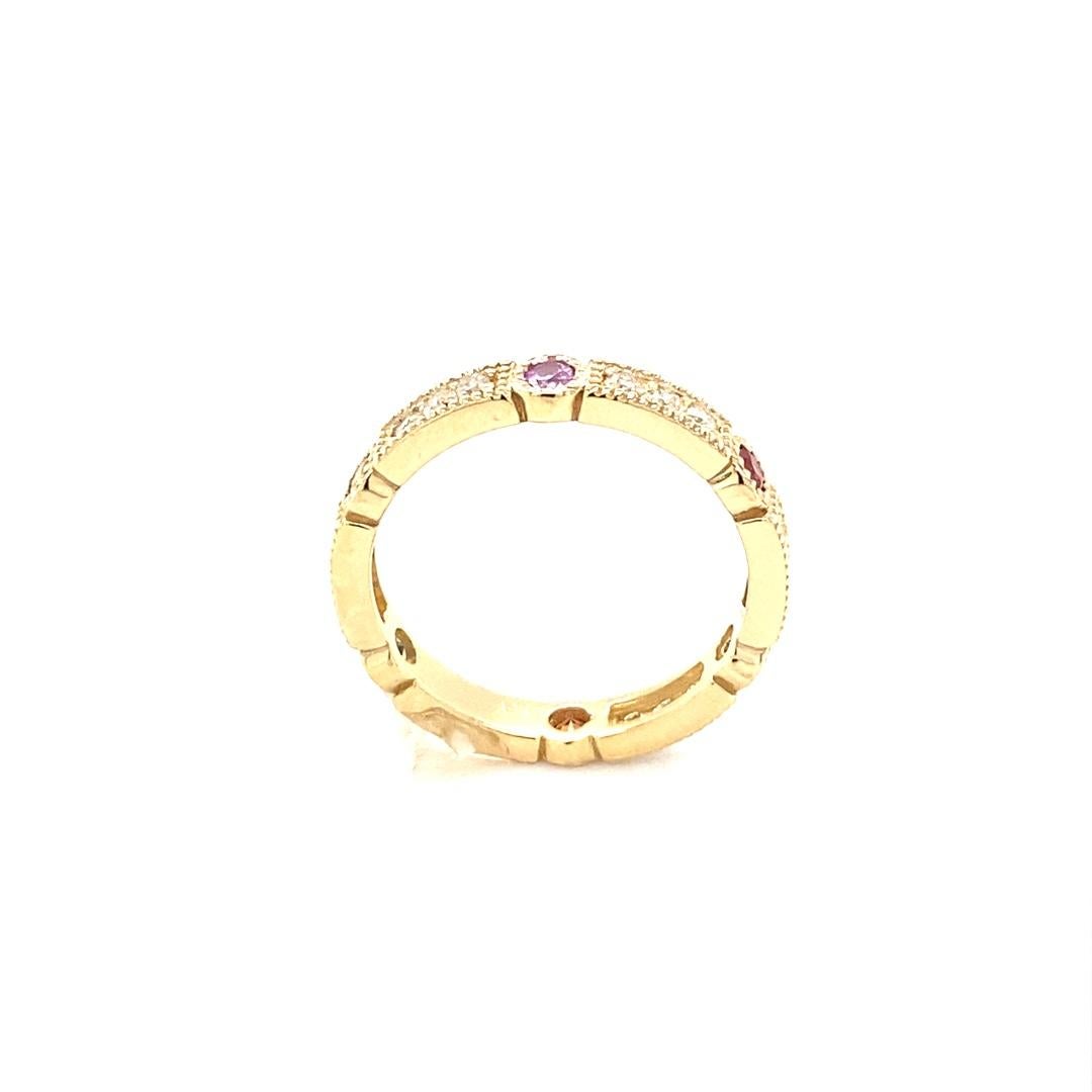 A classic design for a band that has Multicolored Sapphires and Diamonds which is sure to be a great addition to your jewelry collection!  
This band has 6 Round Cut Sapphires that weigh 0.42 carats and 15 Round cut Diamonds that weigh 0.28 carats