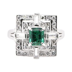 Vintage 0.70 Carat Natural Emerald and Diamond Art Deco Style Ring Set in Platinum